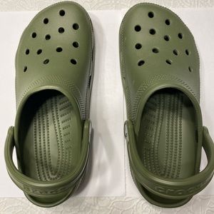 Crocs. Never worn. Size 9 women. Size 7 men.